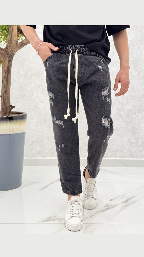 Jeans elastico rotture